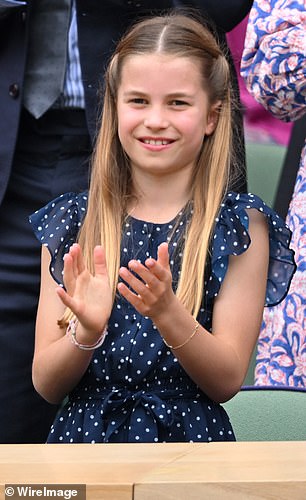 The band, which is made of yellow and red yarn, resembles the versions worn by His Majesty's granddaughter, Princess Charlotte, aged nine, when she attended the Wimbledon final last weekend with her mother, the Princess of Wales.