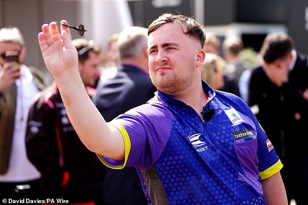 The 20-year-old claimed it was 'stupid' to think she could compete against the likes of Luke Littler (pictured, at Silverstone on July 4)