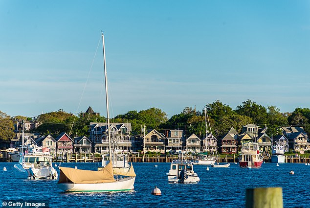 Several sailboats and motorboats moored in a pre-season Oak Bluffs Harbor in Martha's Vineyard