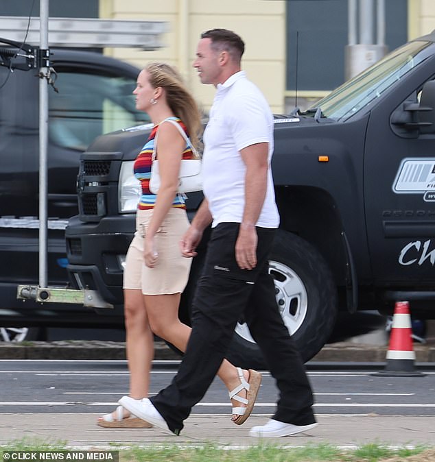 In a series of photos from the set, Kieran was seen wearing a white polo shirt as he filmed scenes with a blonde actress