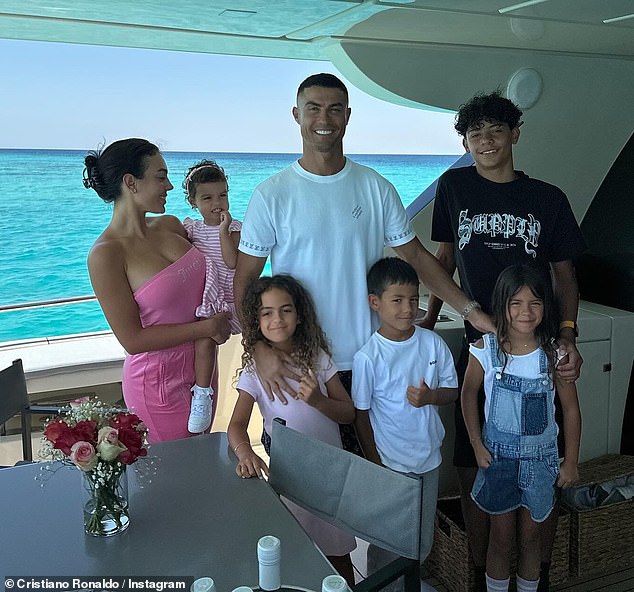 The couple posed on a luxury yacht with their children, daughters Eva María, seven, Alana, six, Bella, two, and son Mateo, seven. Cristiano has a second son, Cristiano Jr., 14.