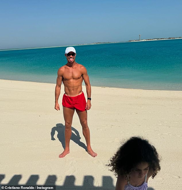 The 39-year-old footballer showed off his incredibly muscular body in red swimming shorts