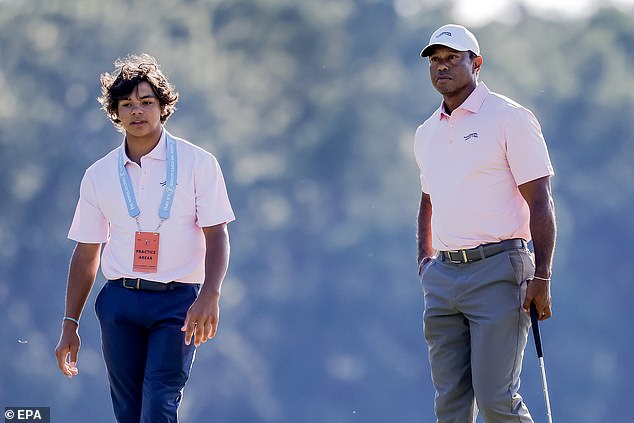 The 15-time major winner and his son on the third hole during US Open practice in June