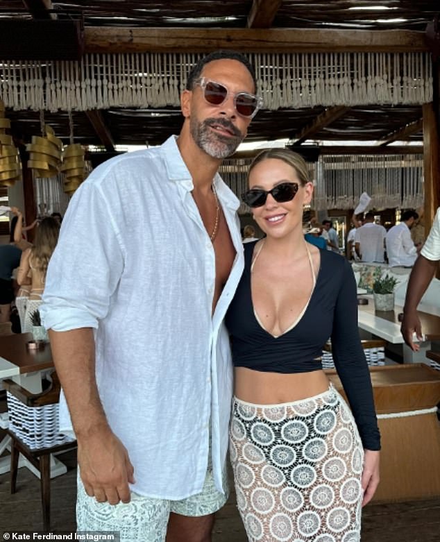 The couple appeared to be in good spirits as they posed for a photo at Principote beach club during their first day on the Greek island