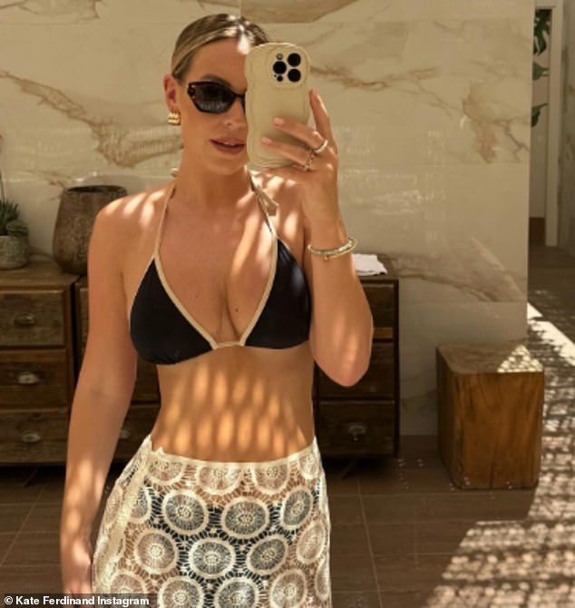 The former TOWIE star, 33, looked amazing in a black bikini which she paired with a white crochet beach skirt and sunglasses