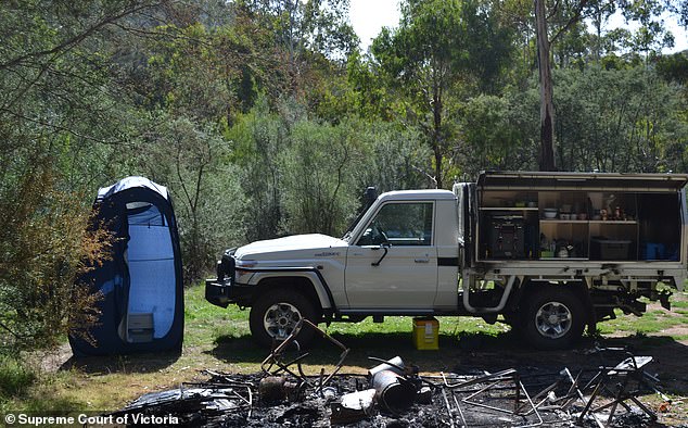 Russell Hill's vehicle and the remains of his tent after Greg Lynn set it on fire