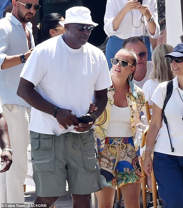 He and his wife Yvette Prieto took a romantic stroll through the city while she held his arm