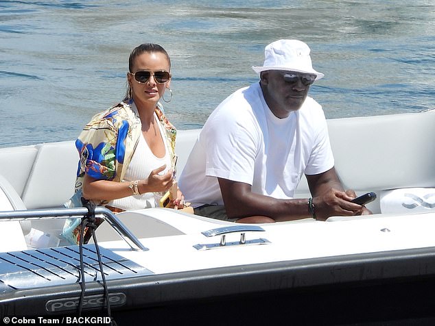 The couple enjoyed a day of boating, with Jordan wearing a white bucket hat and a T-shirt