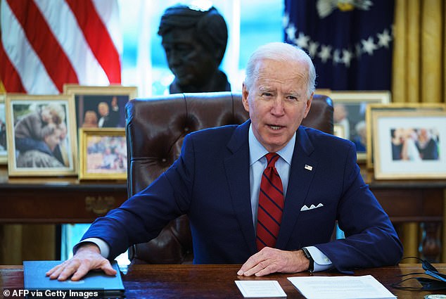 U.S. President Joe Biden speaks before signing executive orders on health care, in the Oval Office of the White House in Washington, DC, on January 28, 2021