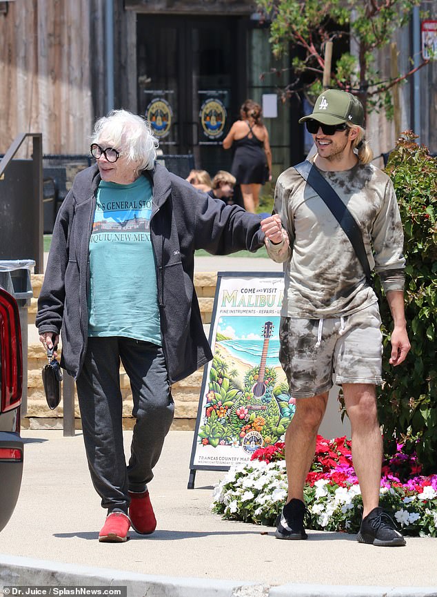 MacLaine was seen with a male friend who helped her walk as they walked outside the establishment, which overlooks Zuma Beach