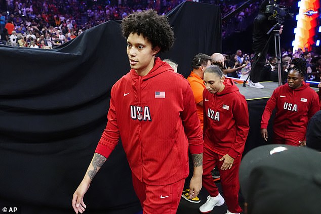 Brittney Griner, left, Diana Taurasi and Chelsea Gray, of Team USA, walk onto the field