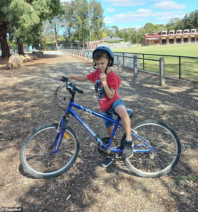 The otherwise active young boy (pictured) has now been diagnosed with influenza-induced encephalitis with encephalopathy