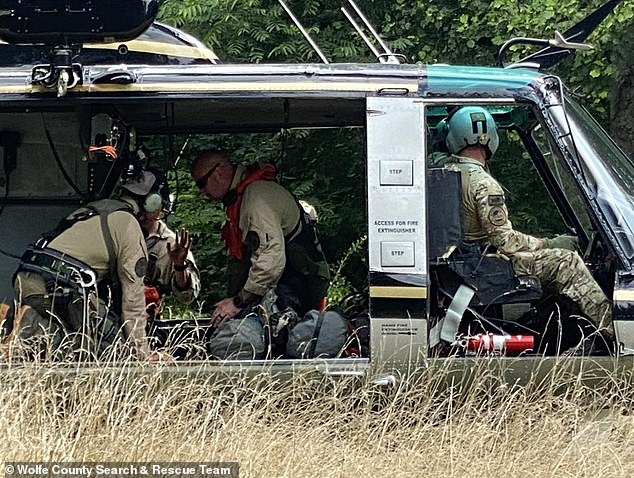 Due to its location in the tough terrain, Kentucky State Police assisted in a hoisting operation