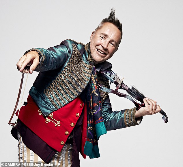 Punk violinist Nigel Kennedy says he was forced to relearn his craft after becoming partially deaf, blaming it on a Covid-19 booster jab he received in 2021