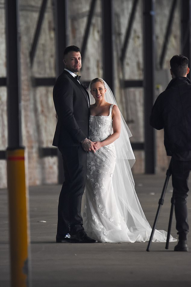 The handsome guy looked impressed as he married his beautiful bride