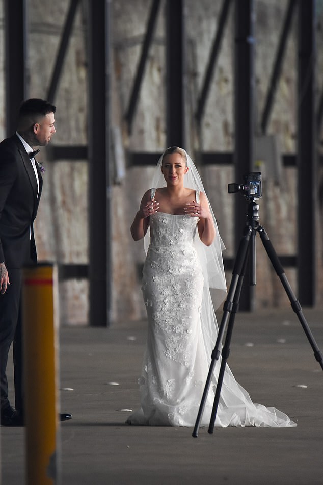 The bride seemed excited and overwhelmed by the attention