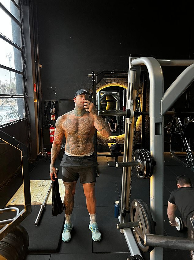 The tattooed hunk is a fan of gym workouts