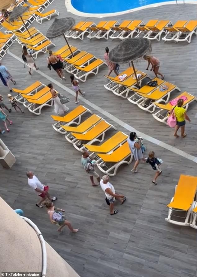 A second video posted to the platform showed holidaymakers bagging their spots at a hotel on Spain's Costa Dorada on the mainland