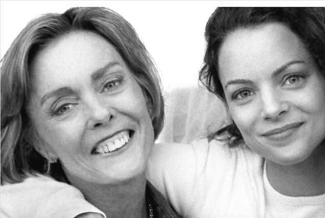 Kimberly pictured with her mother, who was a journalist her entire career and died of Alzheimer's disease in 2016