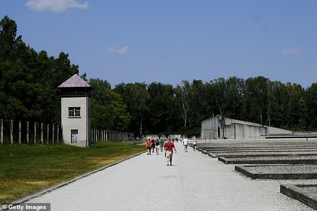 Visitors tour Dachau concentration camp in Germany on July 25, 2022