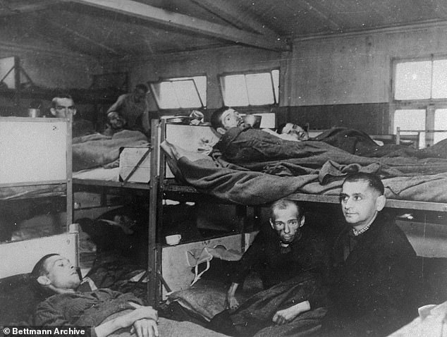 A plaque was also stolen from Flossenbürg in memory of former prisoner Rudolf Nowak. Pictured: Prisoners in their rooms