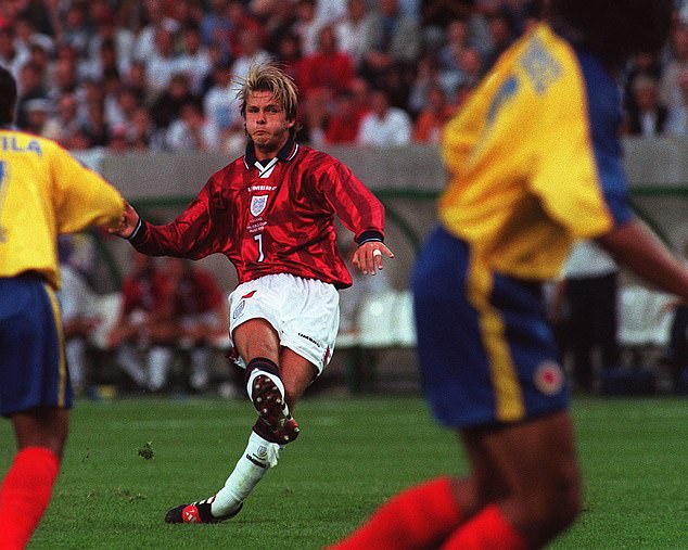 Professor Craig explains that her curiosity about the mechanics of how goalkeepers operate was sparked when she watched David Beckham's (centre) free kicks during the 1998 World Cup.