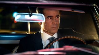 Colin Farrell's John Sugar sits in an open car in Apple TV Plus' Sugar series