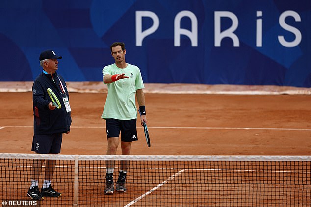 Murray pictured talking to a team coach in preparation for his fifth Olympic Games