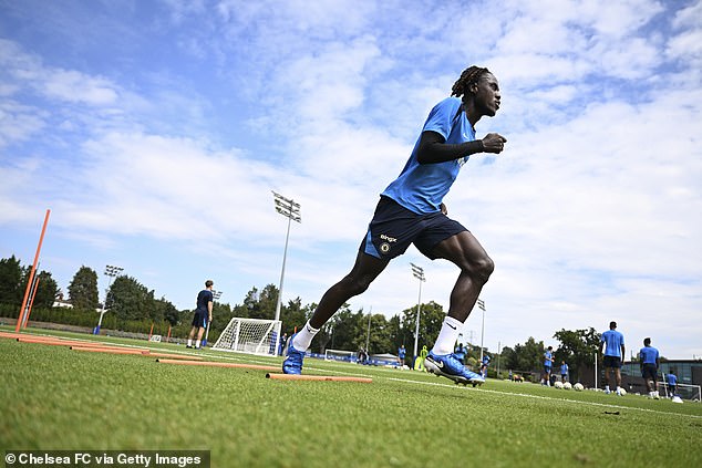 The defender (pictured during training this month) feels he is being forced to leave his home club