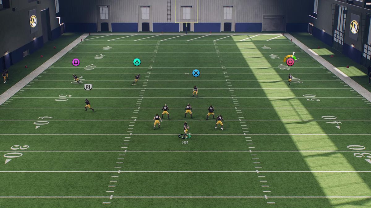 A Mizzou Tigers player prepares to catch a pass with the Placement and Accuracy icon on the screen in College Football 25