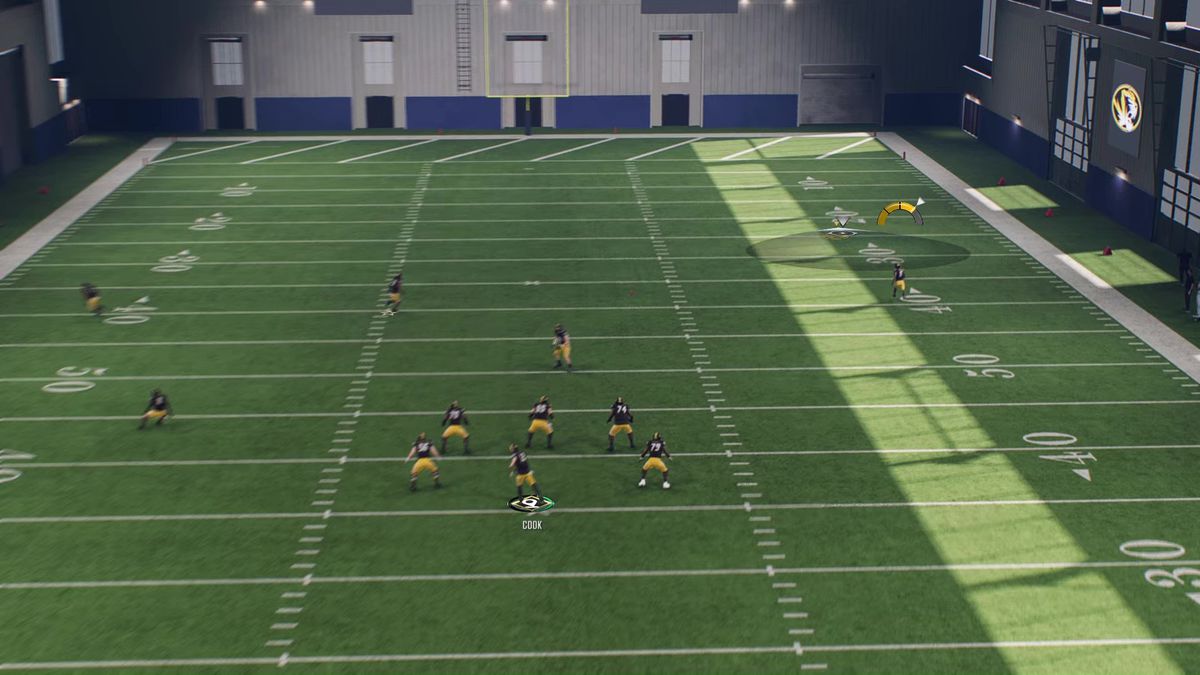 A Mizzou Tigers player prepares to catch a pass with the Placement pass icon on the screen in College Football 25