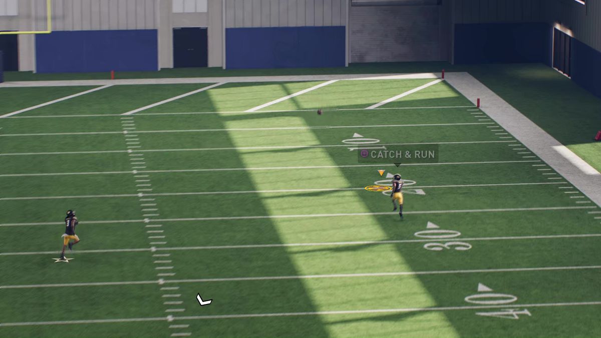 A player prepares to catch a pass in College Football 25 without on-screen graphics due to the classic pass control scheme 