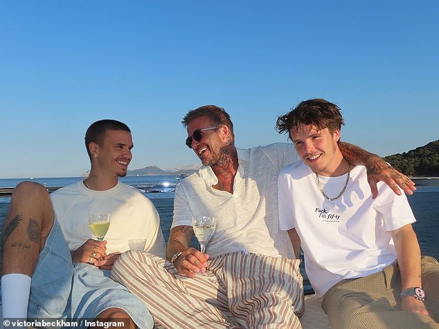 Victoria also shared adorable photos of their children Romeo, 21, and Cruz, 19, posing on a mega yacht in Sardinia