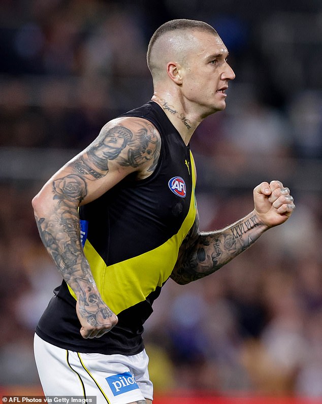 Martin is the uncle of Richmond Tigers star Dustin Martin (pictured on the field against the Brisbane Lions)