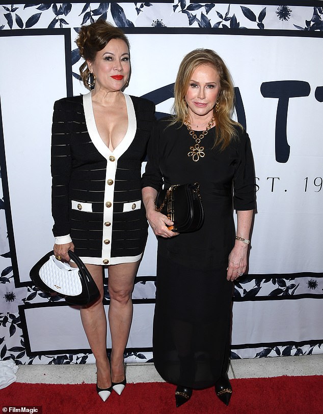 She posed on the red carpet with actress - and new housewife - Jennifer Tilly, who looked stunning in a voluptuous striped cardigan