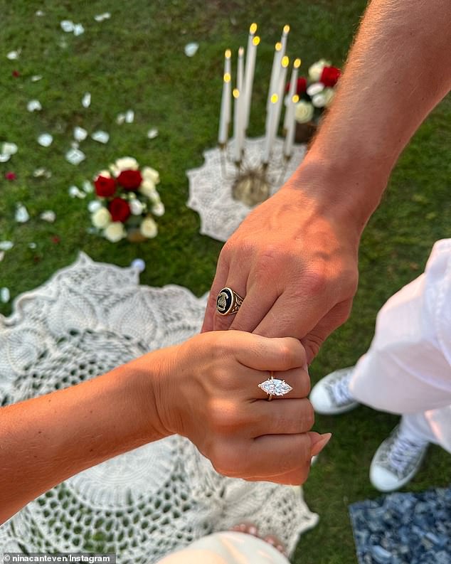 As the sun set, he proposed to Nina with a beautiful gold ring with a huge marquise cut diamond, and of course she said yes