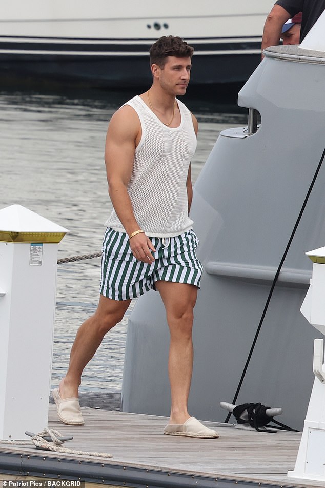 The actress was spotted getting ready to film with handsome model Davide Gianni and more of their castmates on Tuesday. He wore a white crochet tank top and striped shorts for the shoot