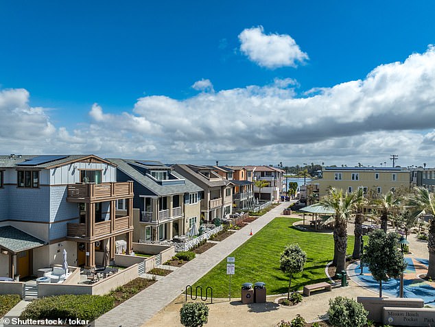 Aerial view of residential luxury single-family beachfront homes on Mission Beach in San Diego. According to Zillow, the average home on Mission Beach costs almost $1.9 million