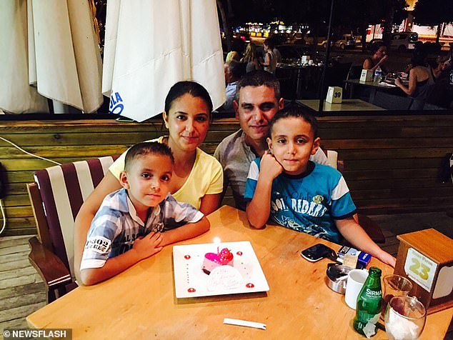 Veysel Aydogmus, 37, (top right) pictured with his wife Emine, 35 (top left) and their two sons Batuhan, 16, (bottom right) and Mete, 13, (bottom left) before the accident