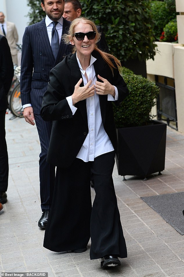 Celine looked cheerful on Tuesday as she arrived at her hotel in Paris in preparation for the Olympic Games