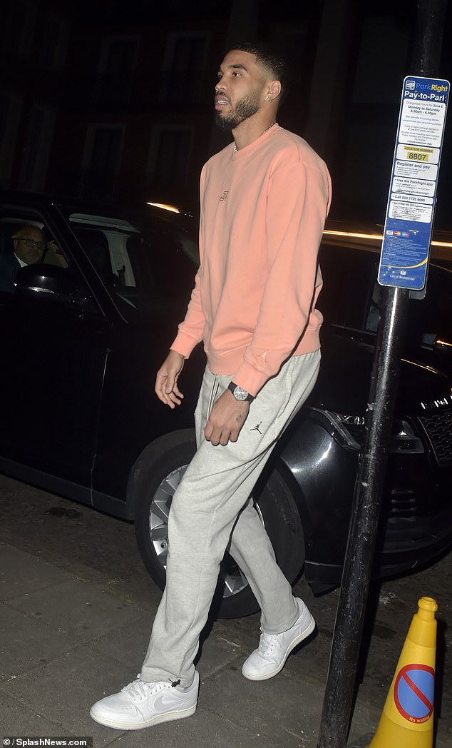 Jayson Tatum opted for an orange Air Jordan jersey and sweatpants for the party in London