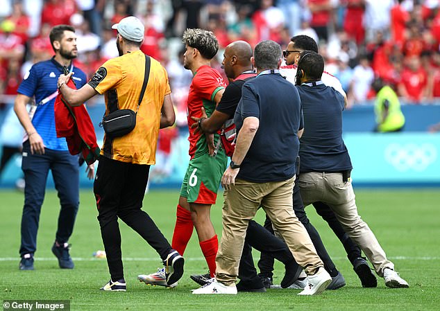 Substitutes had found their way onto the field of play after Argentina's final goal