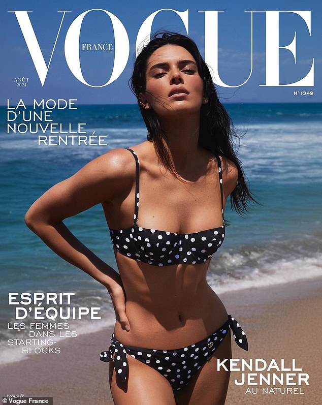 The cover photo showed Jenner in a classic black bikini with white polka dots, with the wind blowing through her hair