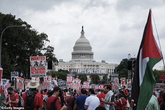 Thousands of people gather to protest outside Capitol Hill