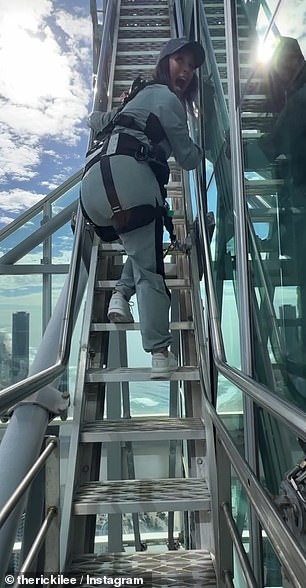 The former Australian Idol contestant, 38, shared a video on Instagram on Wednesday showing herself twerking as she climbs the Gold Coast's Q1 Tower