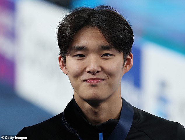 Palfrey told Korean TV reporters he hoped world champion Kim Woo-min (pictured) would beat Australians Sam Short and Elijah Winnington in the 400-meter freestyle