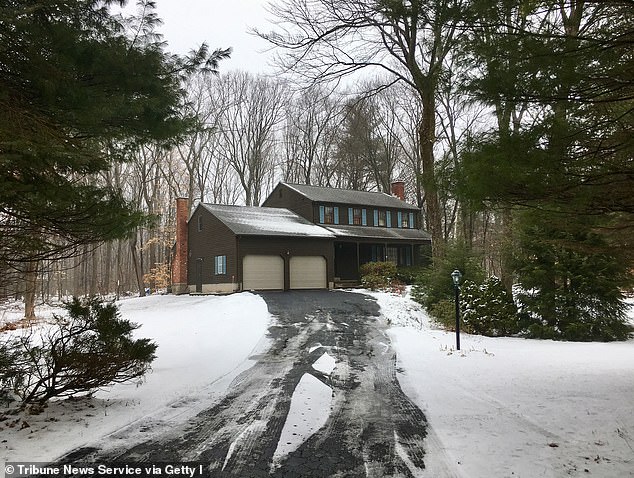 Investigators said Kosuda-Bigazzi wrapped his body in a blanket and left it in the basement of their home (pictured) before continuing to collect his paycheck until her arrest in February 2018.