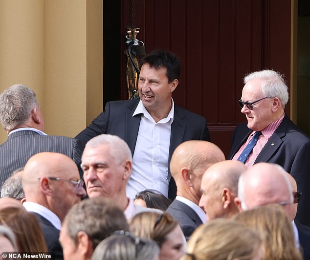 Morrow, whose broadcasting career spanned half a century, died of brain cancer on July 17 at the age of 71 and was given a grand farewell at St Brigid's Catholic Church in Coogee on Thursday. Rugby league legend Laurie Daley is pictured centre