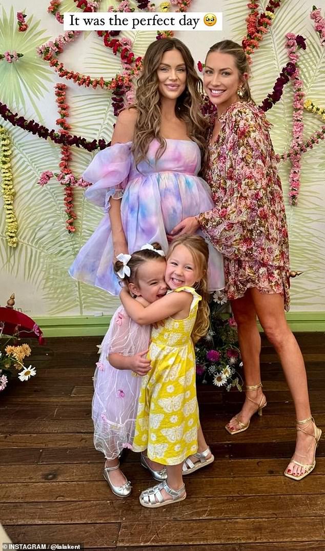 Earlier this month, she shared photos from her baby shower, looking radiant in a short off-the-shoulder pastel dress that channeled her inner princess