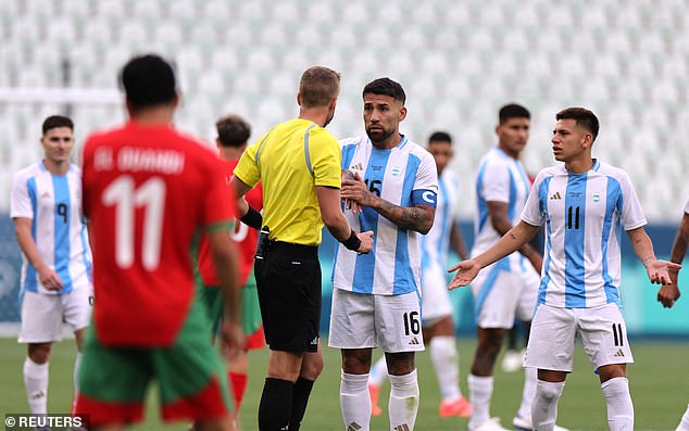 The referee had little option but to take the players off the pitch until the crowd had been evacuated